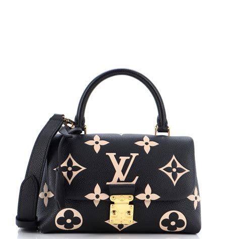 louis vuitton melanie|louis vuitton madeleine monogram empreinte.